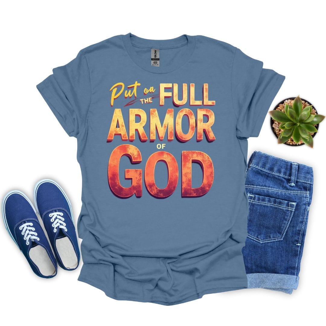 Indigo blue t-shirt with 'Put on the Full Armor of God' text, blue sneakers, and jeans on a white background.