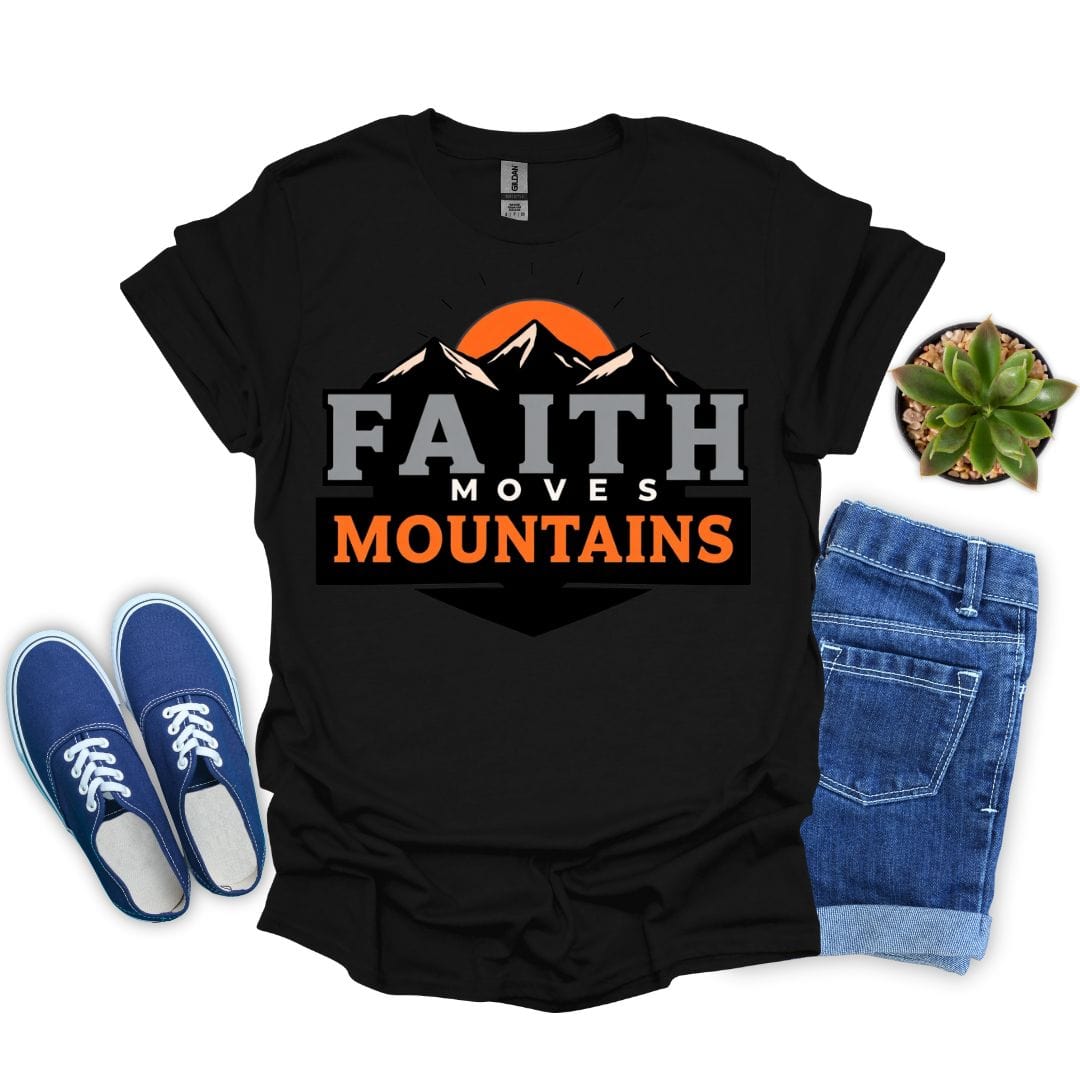 Black t-shirt with 'Faith Moves Mountains' design, blue sneakers, jeans, and a plant on a white background