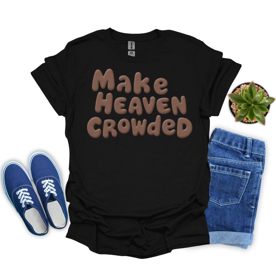 Black t-shirt with 'Make Heaven Crowded' text, blue sneakers, denim shorts, and a plant on a white background