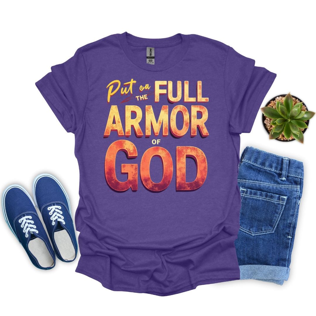 Heather purple t-shirt with 'Put on the Full Armor of God' text, blue sneakers, and jeans on a white background.