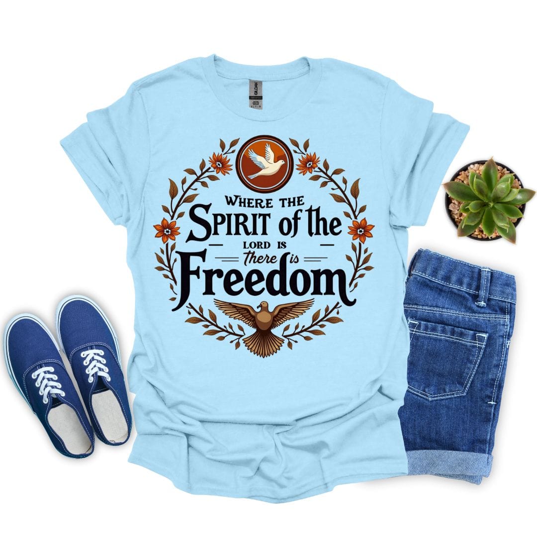 Light blue t-shirt with 'Where the Spirit of the Lord is, there is Freedom' design, paired with blue sneakers and jeans on a white background.