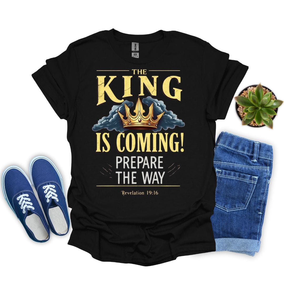 Black t-shirt with 'The King is Coming! Prepare the Way' text, blue sneakers, and jeans on a white background