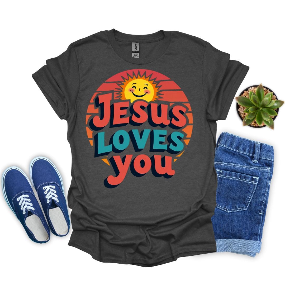 Dark heather t-shirt with 'Jesus Loves You' design, blue sneakers, and jeans on a white background
