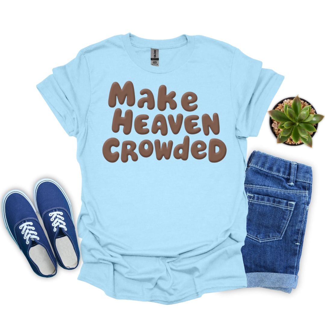 Light blue t-shirt with 'Make Heaven Crowded' text, paired with blue sneakers and jeans on a white background.