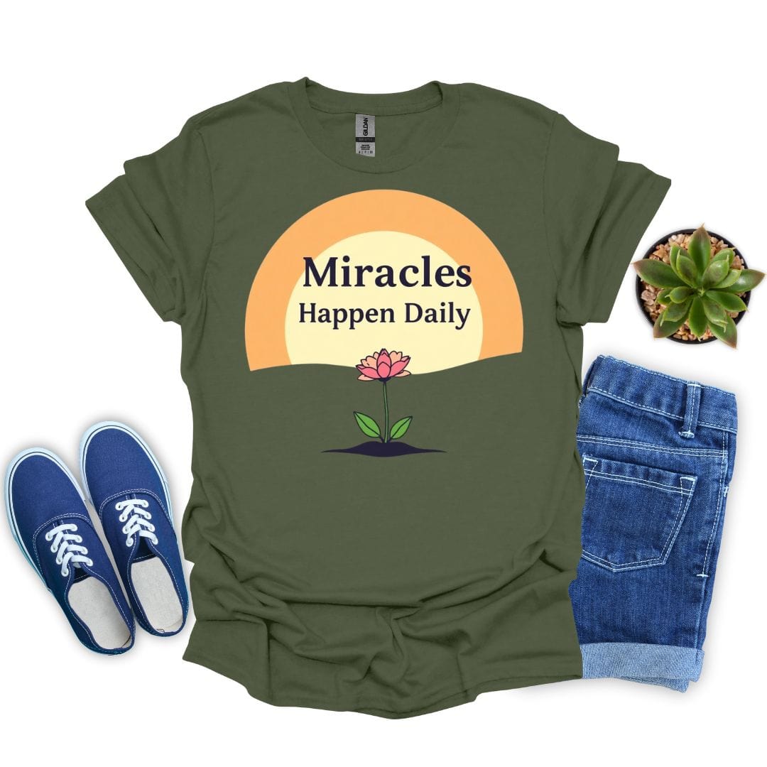 Military green t-shirt with 'Miracles Happen Daily' design, blue sneakers, and jeans on a white background