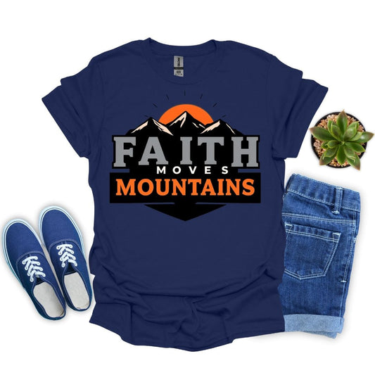 Navy blue t-shirt with 'Faith Moves Mountains' graphic, paired with blue sneakers and jeans on a white background.