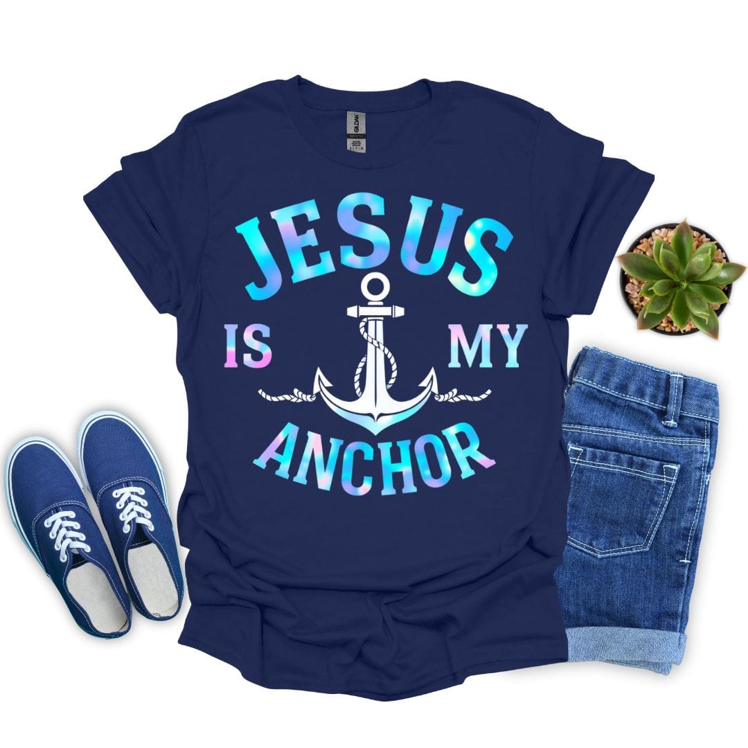 Navy blue t-shirt with 'Jesus is my anchor' design, paired with blue shoes and jeans on a white background.