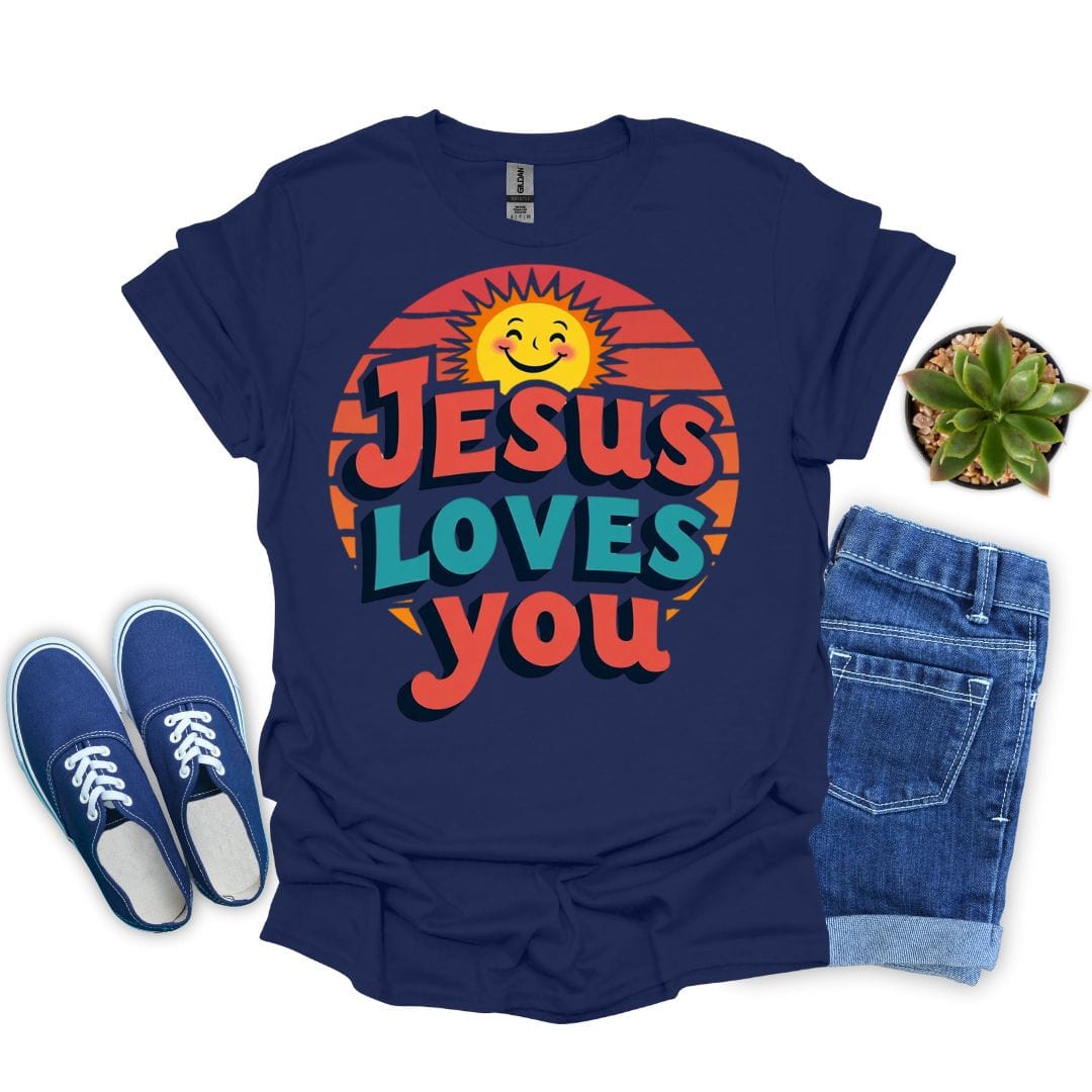 Navy blue t-shirt with 'Jesus Loves You' design, paired with blue sneakers and jeans on a white background.
